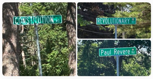 Street signs: Revolutionary Rd, Constitution Rd, Paul Revere Rd