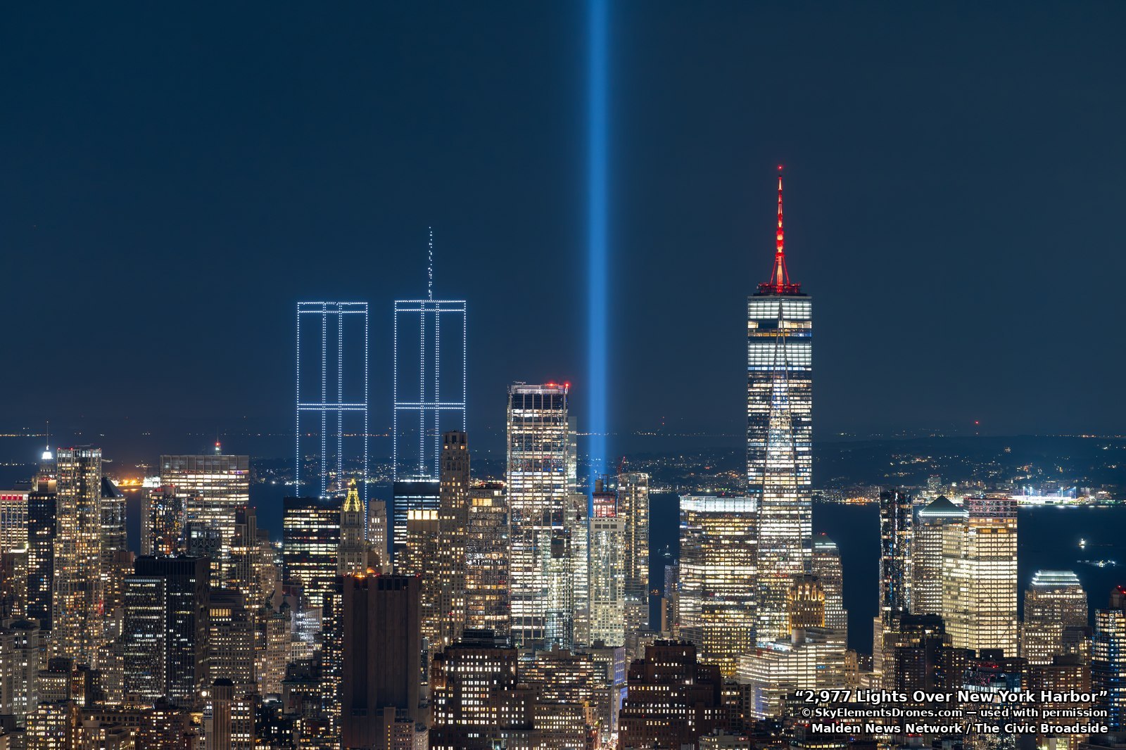 The reconstructed Twin Towers in light, rising over the New York skyline