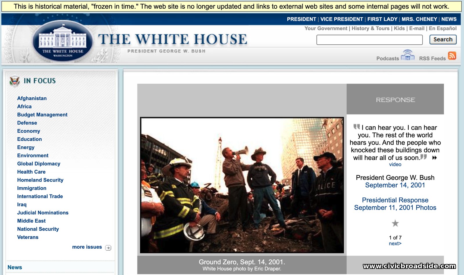 Archived georgewbush-whitehouse.archives.gov page, 'Remembering 9-11-01,' showing the President's Sept. 14, 2001 bullhorn photo at Ground Zero with the site's original 2001-era navigation, including a 'Kids' menu link